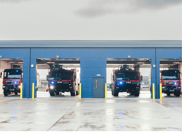 RAF Vehicles and troops photographed with the new Fire Station at RAF Lossiemouth, December 5 2022
