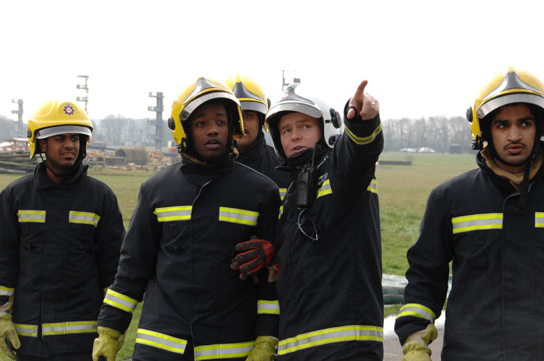 Firefighter trainees and instructor