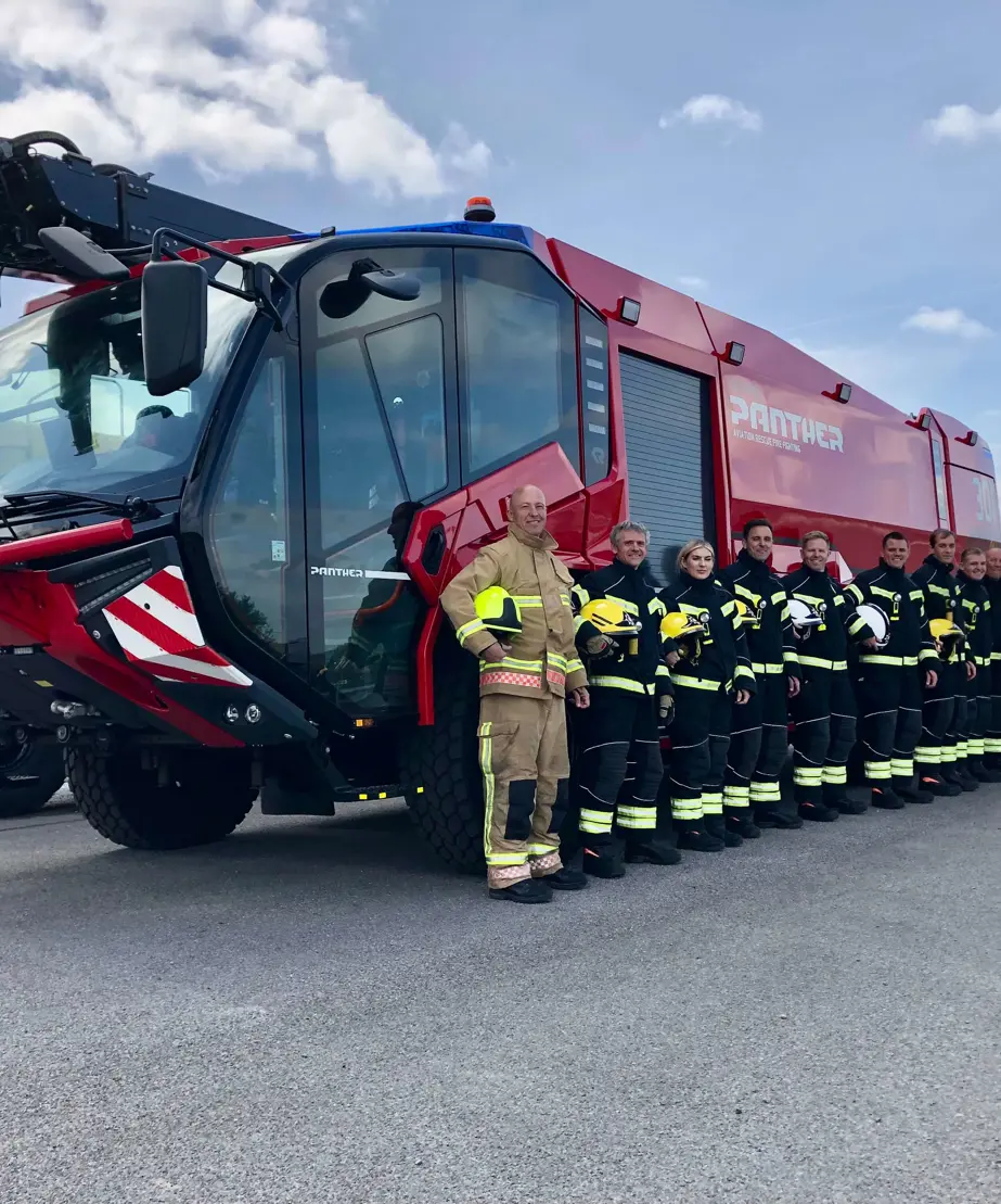 Panther fire truck with firefighting team