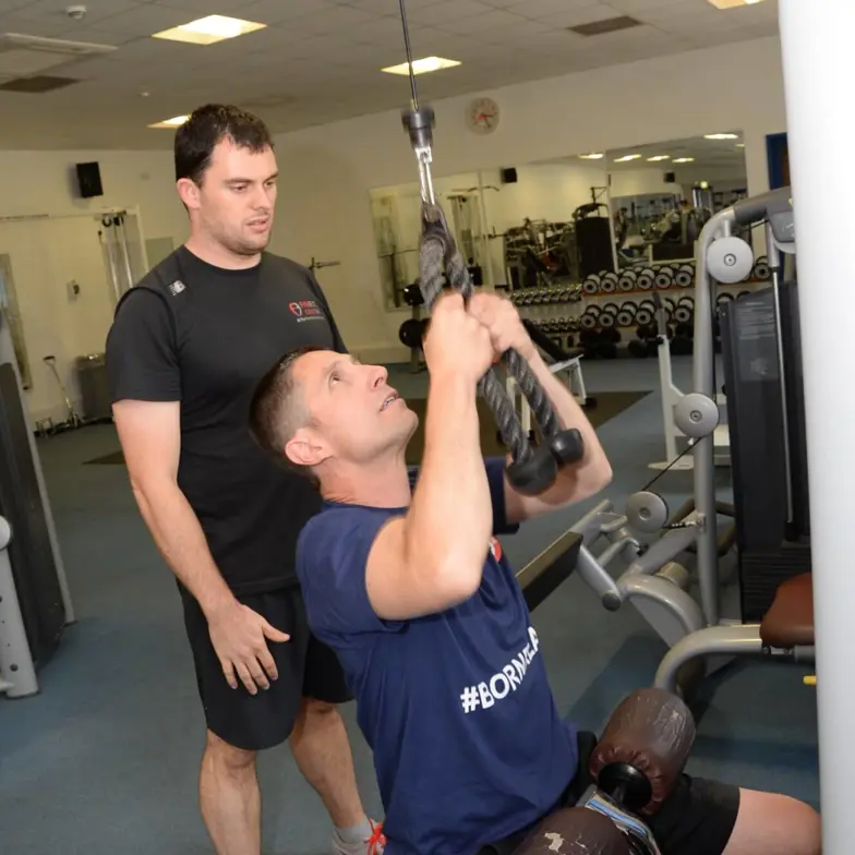 Person using exercise equipment Person using exercise equipment
