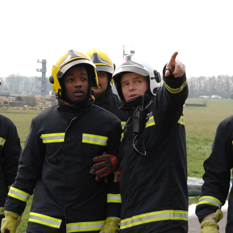 Firefighter trainees and instructor